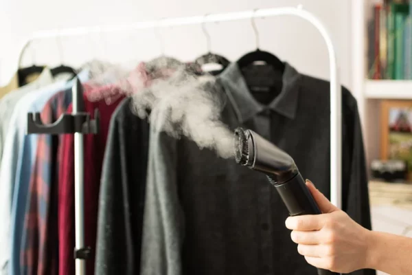 Use a steamer to get wrinkles out of a swimsuit